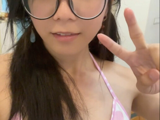 Cute little girl's first-ever swimsuit experience