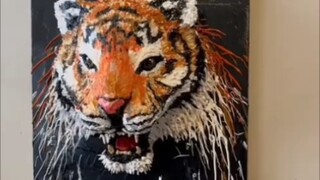 The students of the Academy of Fine Arts used more than one hundred catties of paint to make a tiger