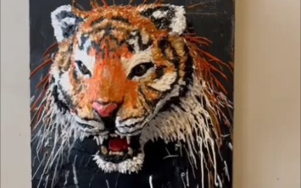 The students of the Academy of Fine Arts used more than one hundred catties of paint to make a tiger