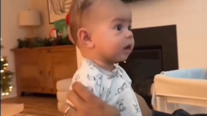 The baby’s expression says it all—pure disgust written all over their face.