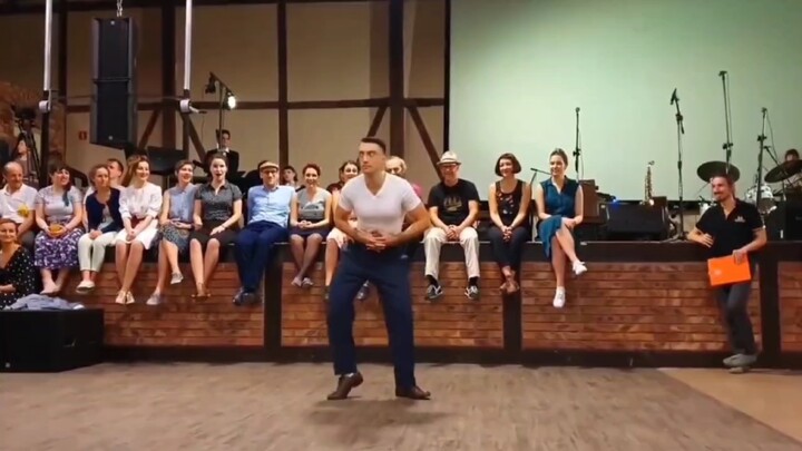 Playful swaying, Chaplin-style tap dancing