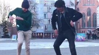 The guy asked passers-by to teach him how to dance on the street