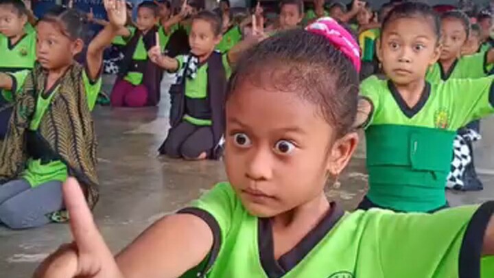 Children on Bali are seriously learning local traditional dance