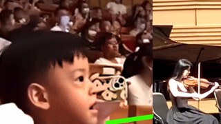 The children at the concert shouted "Dream" loudly, and the orchestra's actions in the next second i