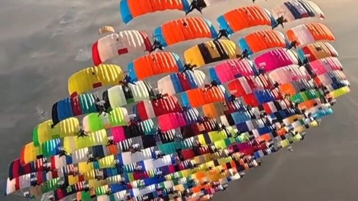 Real footage, not AI: 104 skydivers from 20 countries set a new world record for formation skydiving