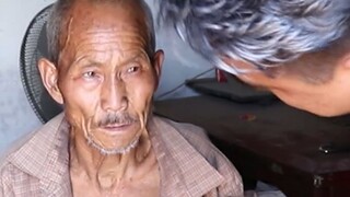 An elderly man who has been eating a bowl of chili peppers for three whole years—though life is toug