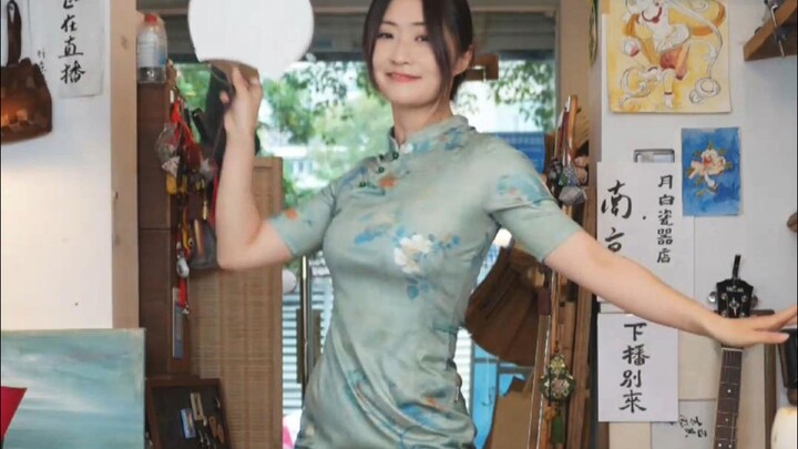 Grain in Ear, is it considered a traditional Chinese style cheongsam home dance?