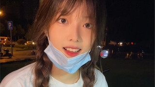 This girl is selling kimchi, she must make a few more bowls