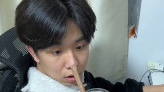 Handing my boyfriend a glass of water with a spoon very suspiciously