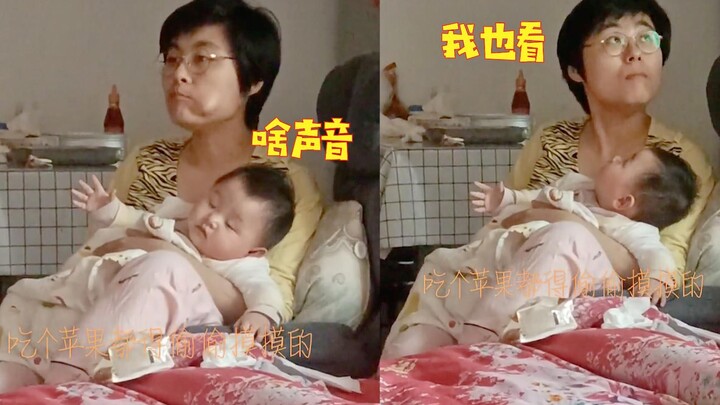 Mom secretly eats an apple while carrying baby on her back; caught red-handed, she pulls off the ult