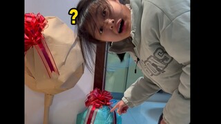 The gift is a surprise.