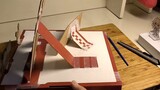Membuat stand dengan kotak pizza yang dihubungkan oleh Genshin Impact Pizza Hut