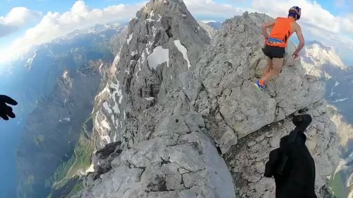 Two German ski mountaineers are climbing a mountain—whom do you think is more impressive?