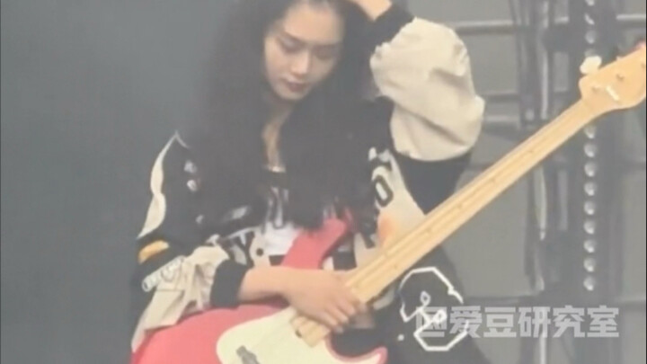 The singing is really beautiful, and the bassist is really good-looking too.