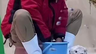 Cute Keeper and Adorable Sea Otter