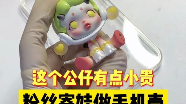 A fan sent me a slightly pricey figurine and asked me to make a phone case out of it.