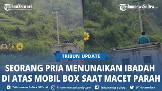 Viral Video Seorang Pria Salat di Atas Mobil Box saat Lalu Lintas Malalak Macet Parah