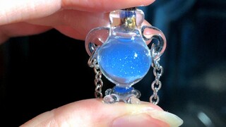 Blowing a magic bottle out of glass