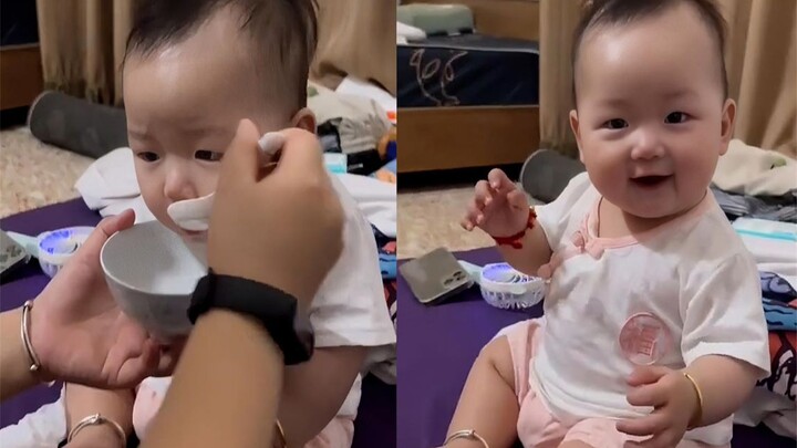 The little kid taking medicine was cheered on by everyone, gradually becoming so carried away that h