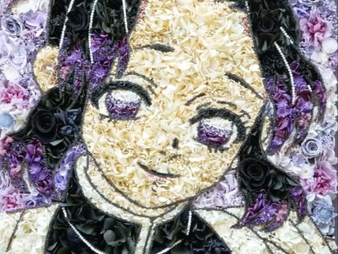 Use flowers to spell out the appearance of Shinobu Kocho