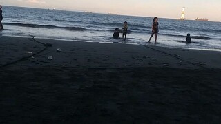 Menikmati senja di pantai.