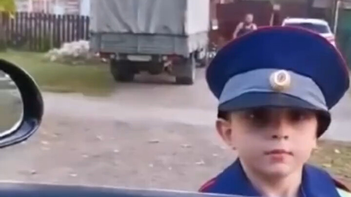 Russian kid cosplays as a traffic cop—professional skills ingrained in their DNA