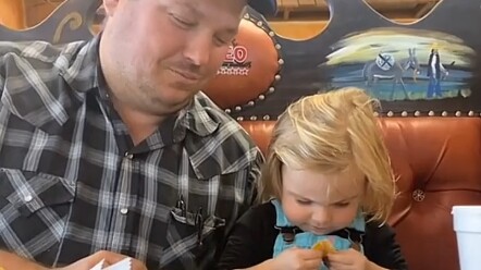 Tricked by dad—such a sweetie who always lets dad have the yummy treats first!