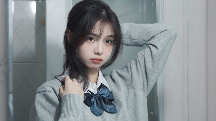 Female college students try the new JK uniform