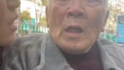 An elderly man falls off his bike, but no one dares to help—until a woman films the scene to documen
