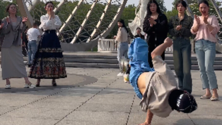 Street dance performance draws a crowd of cute girls—this vibe is absolutely electric!