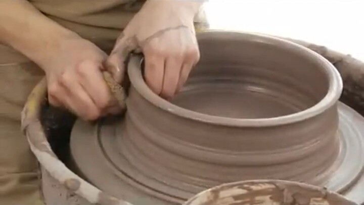 How to Make a Clay Casserole Dish - Pulling Up Clay on a Spin Wheel