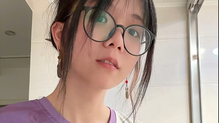 A long-haired man explains hair care.