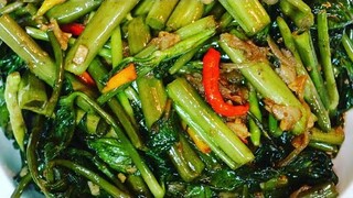 Stir fry Thai morning glory with shrimp paste ผักบุ้งไทยผัดกะปิ