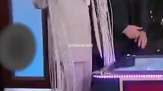 Zendaya and Tom Holland compete in table tennis