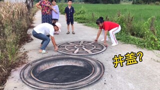 在马路上个井，路人都当真了，都跑去抬井盖！