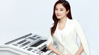 "Blooming": Listen to the Full Version Performed on Dual Keyboard by Wang Xiaowei