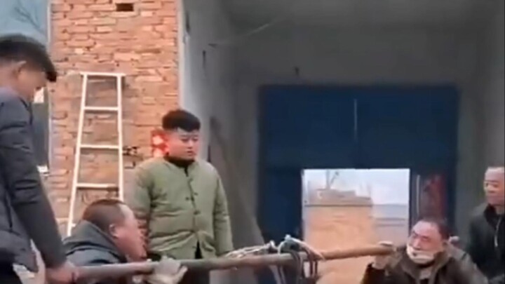 Four big men can’t lift one tiny girl.