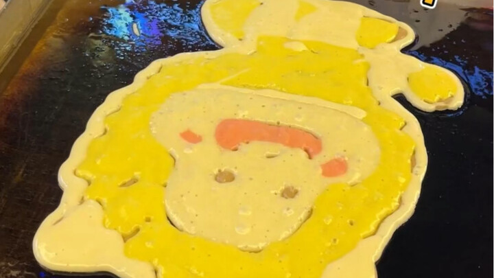 The cartoon-style crepes at the night market still pack quite a punch—this is the chef’s fifth day o