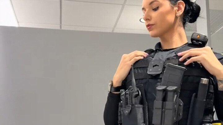 A display of American female police officers' daily patrol uniforms and equipment.