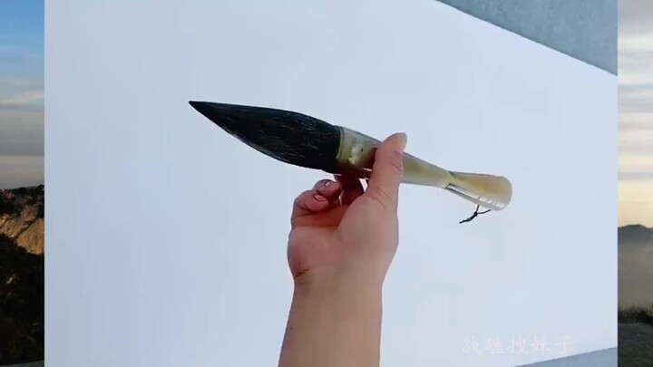 ดูเหมือนกำลังเขียนตัวอักษรแต่ที่จริงกำลังวาดภาพอยู่