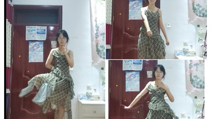 一身素轻纱，草柄当头花…