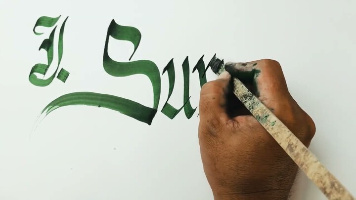 Calligraphy Writing With Bamboo "J Suryana"