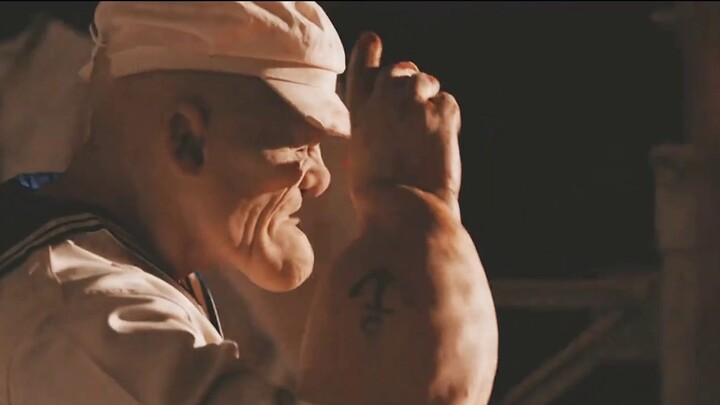 This monster right in front of us, with two balls hanging from its chin and arms thicker than its le