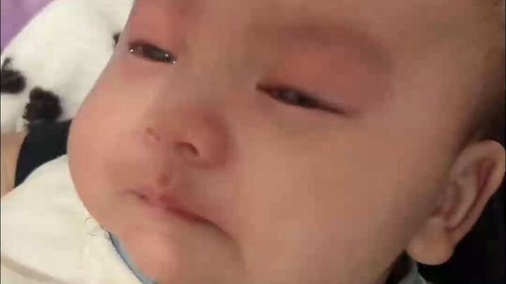 The baby let out a sharp, clear cry! That sudden wail made me laugh!