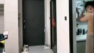 A muscular guy is home alone; after delivering the food, the delivery guy leaves and then comes back