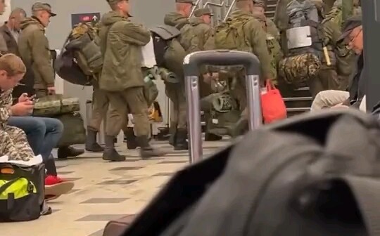 Personnel who have volunteered to join the army are traveling by train from Moscow to the front-line