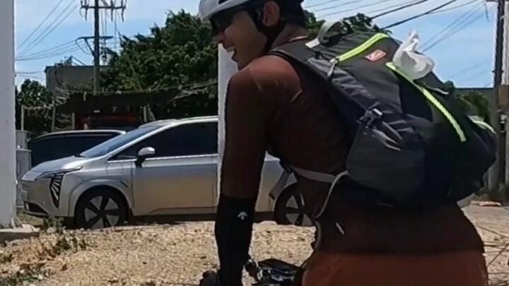 I ran into Wu Lei riding on the road, dressed in full cycling gear with his legs sunburned bright re