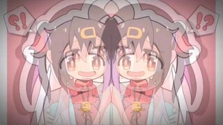 >~<