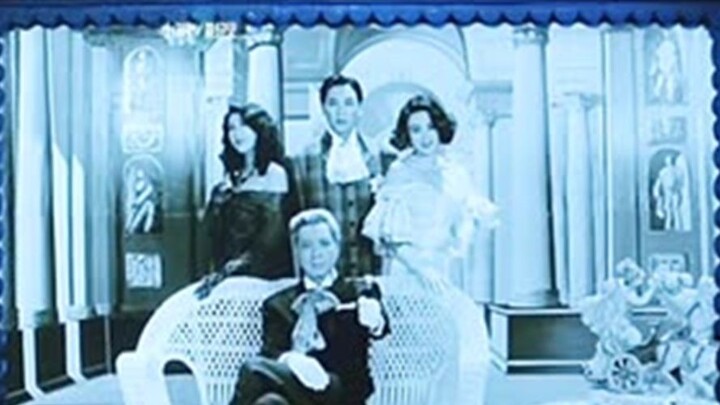 พระเต๋ากำลังปิดผนึกผีในภาพ และโจรบุกเข้าไปในบ้านและถูกผีเข้าสิง