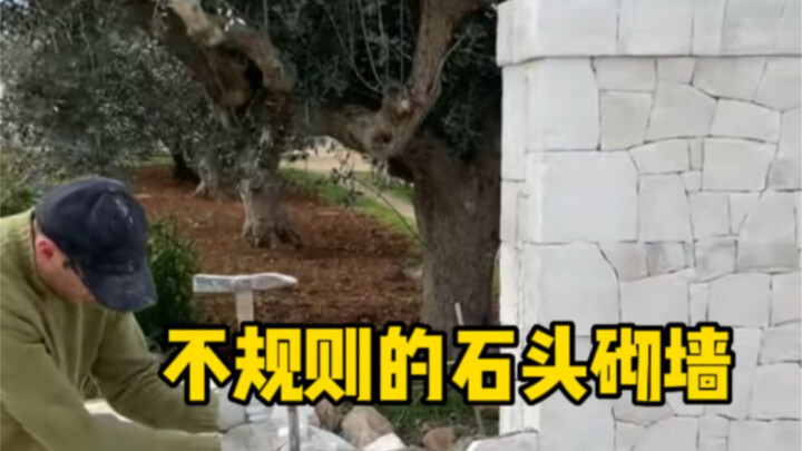This is so stress-relieving—using irregular stones to build such a perfectly level wall!